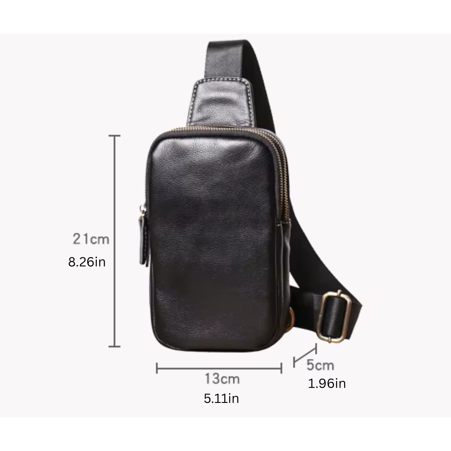 Black leather crossbody bag with measurements on a white background