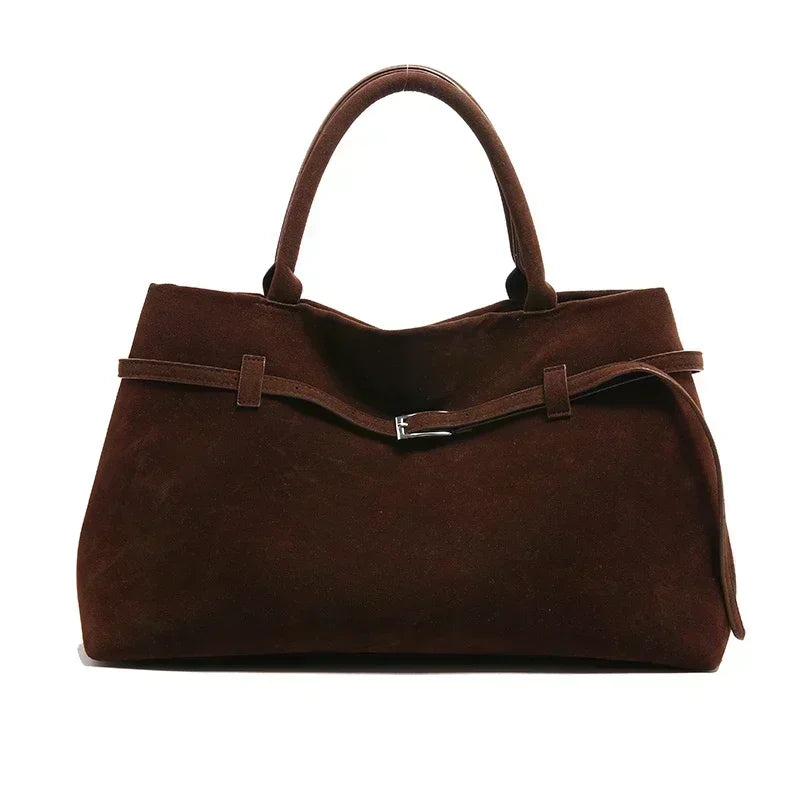 Brown handbag with a belt detail on a white background