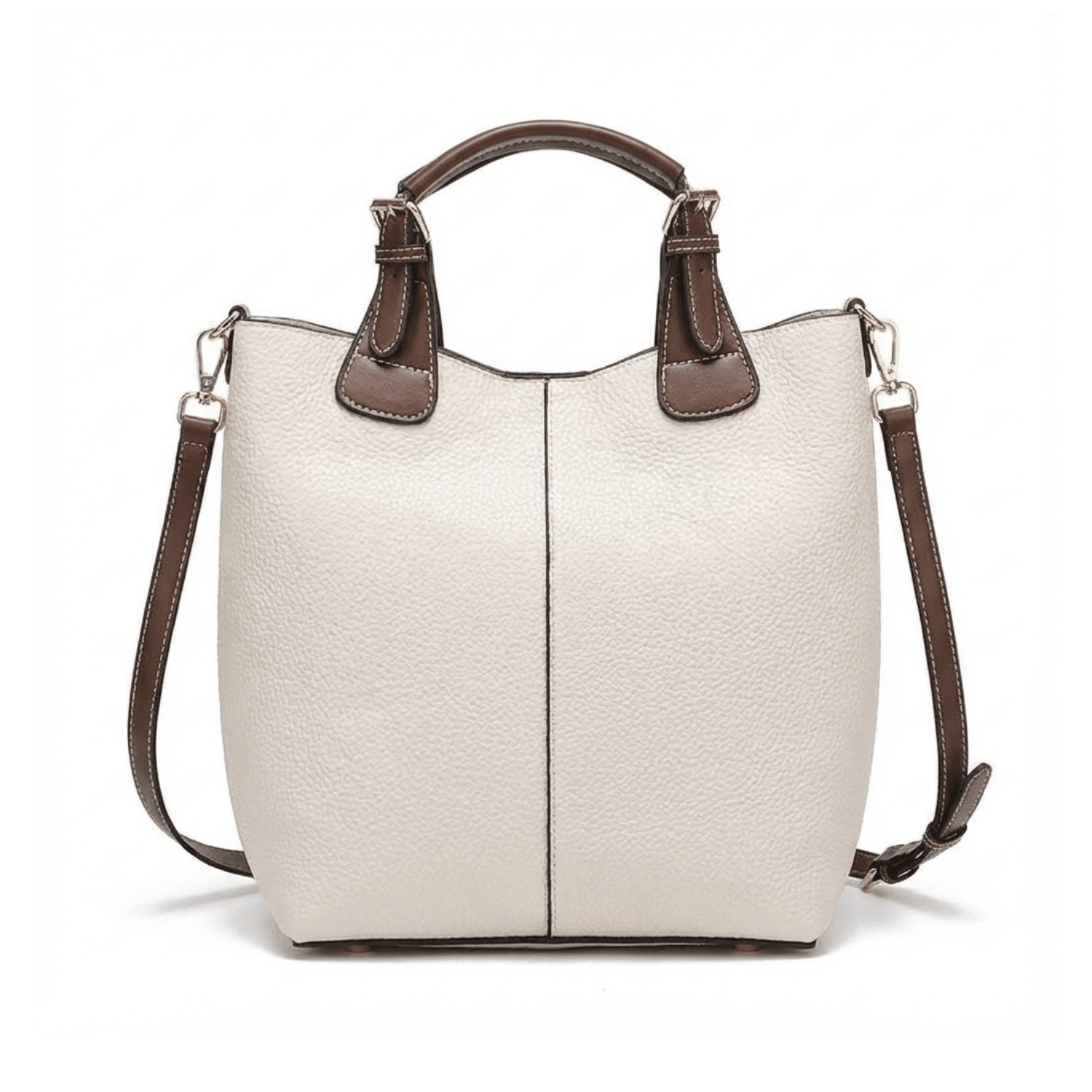 Beige handbag with brown handles and strap on a white background
