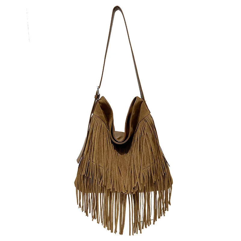 Brown suede handbag with fringe details on a white background