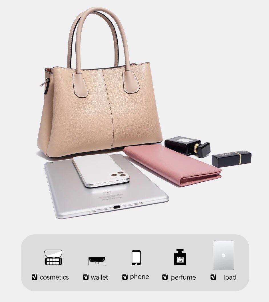 Beige handbag with phone, wallet, and cosmetic items on a light gray background