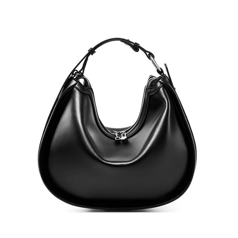 Black handbag on a white background