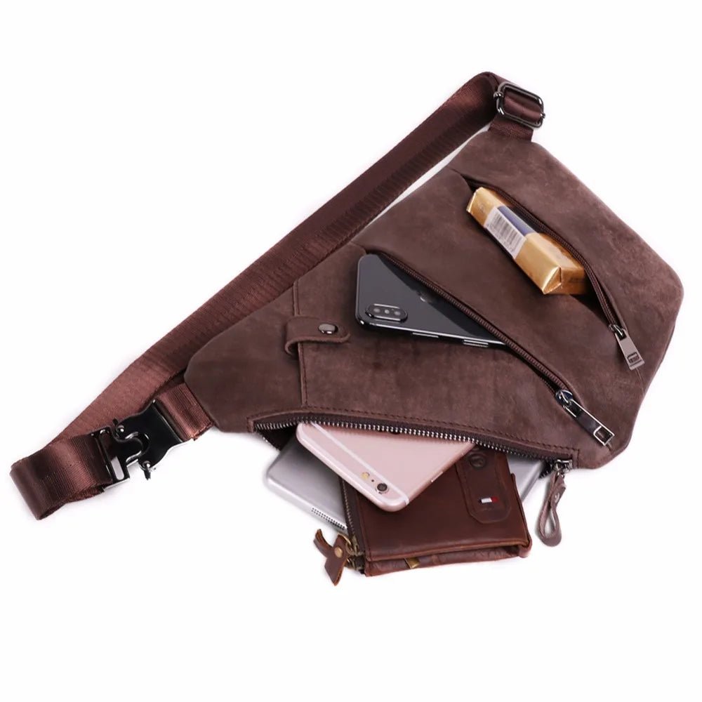 Brown suede waist bag with phone, wallet, and other items on a white background