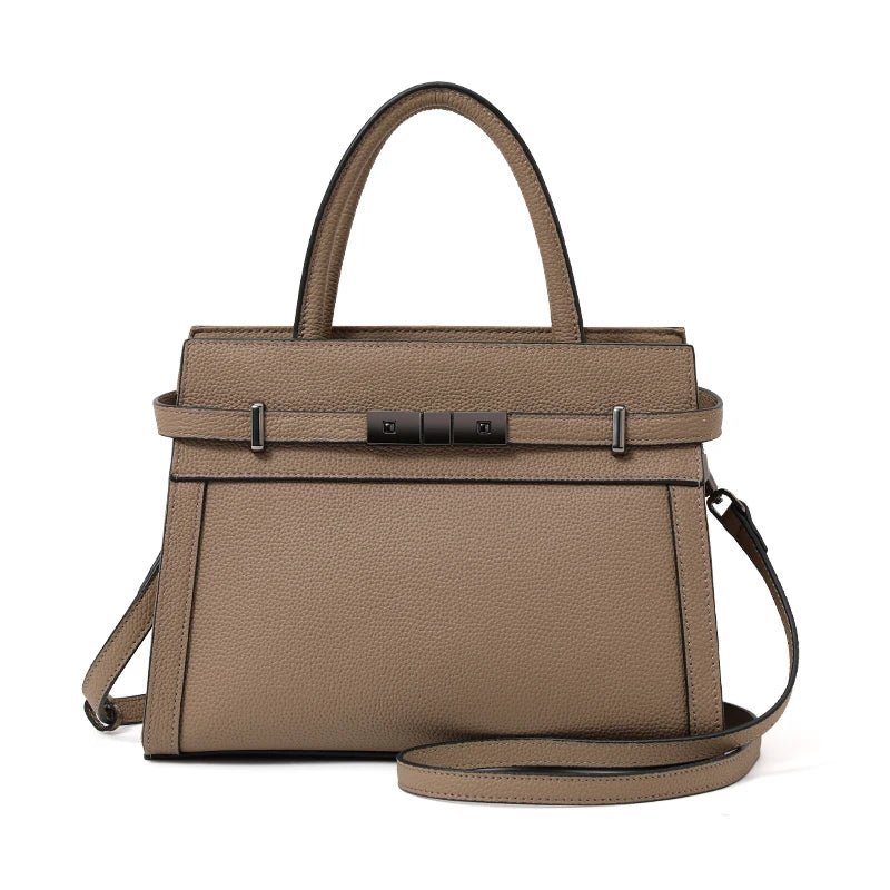 Beige handbag with a shoulder strap on a white background