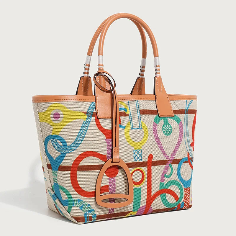 Colorful handbag with abstract patterns on a light background