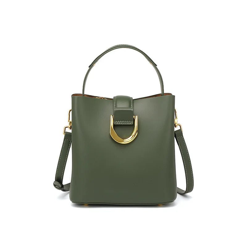 Green handbag with gold clasp on a white background