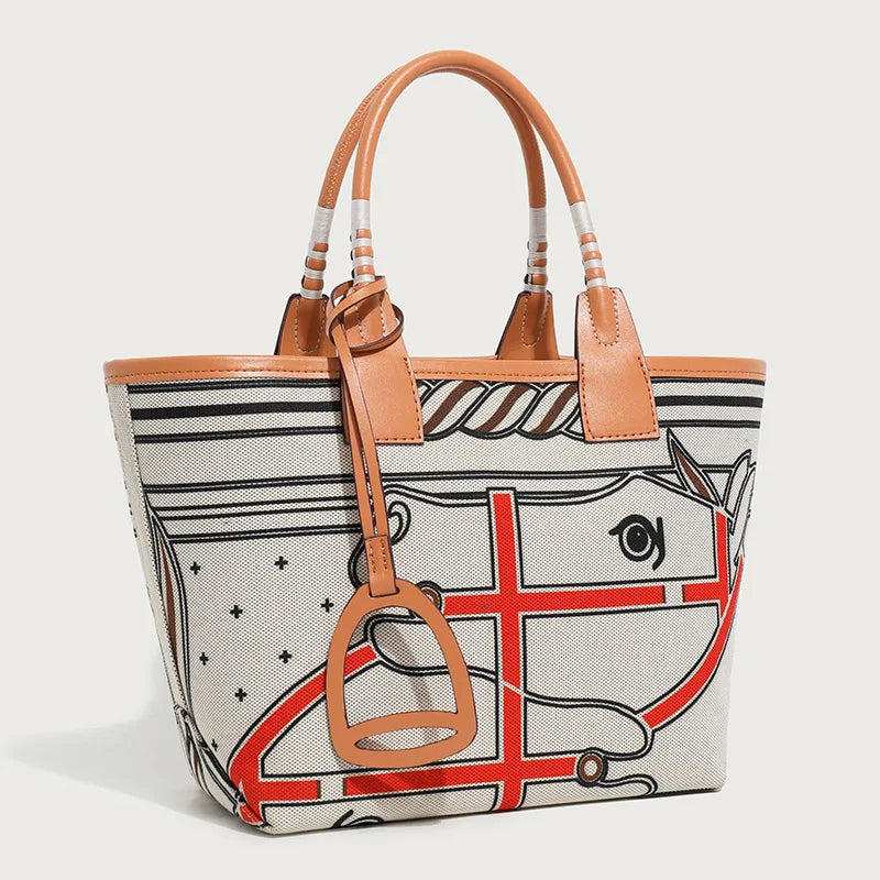 Handbag with horse design and brown leather straps on a light gray background