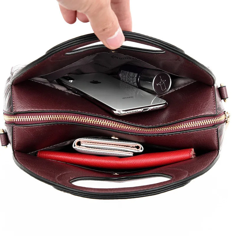 Vanderwah Handtasche: Geprägtes Design mit geräumigem Luxus