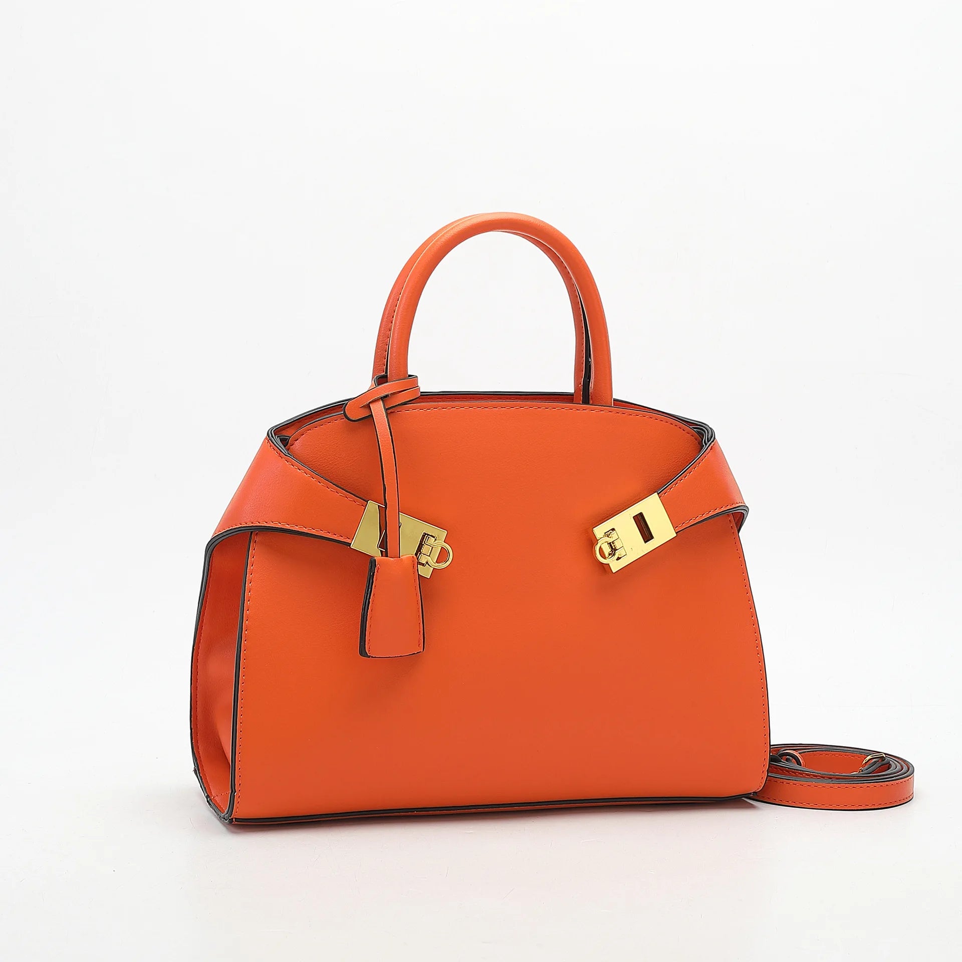 Orange handbag with gold accents on a white background