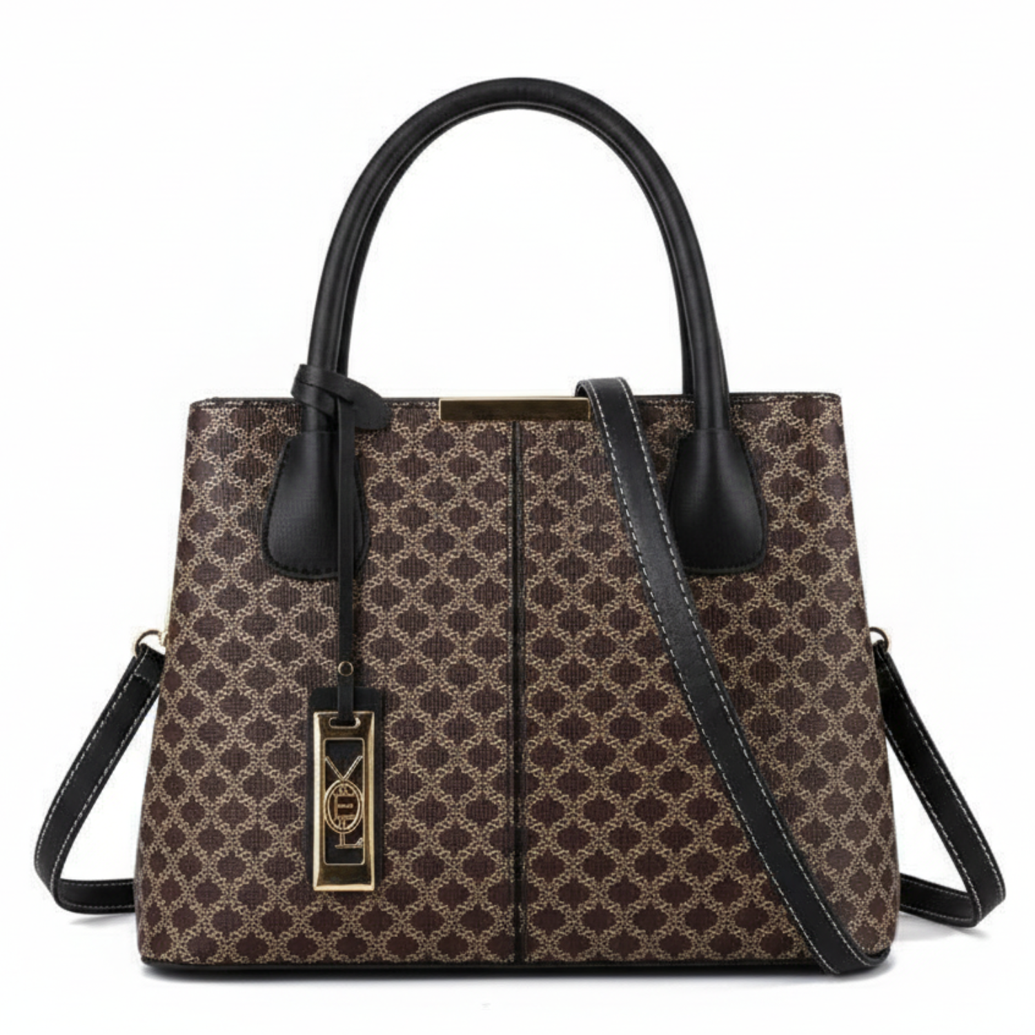 Patterned handbag with black handles and strap on a white background