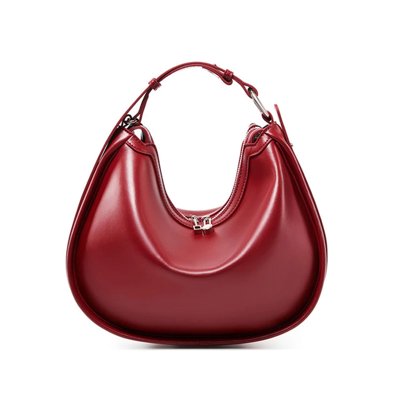 Red handbag on a white background