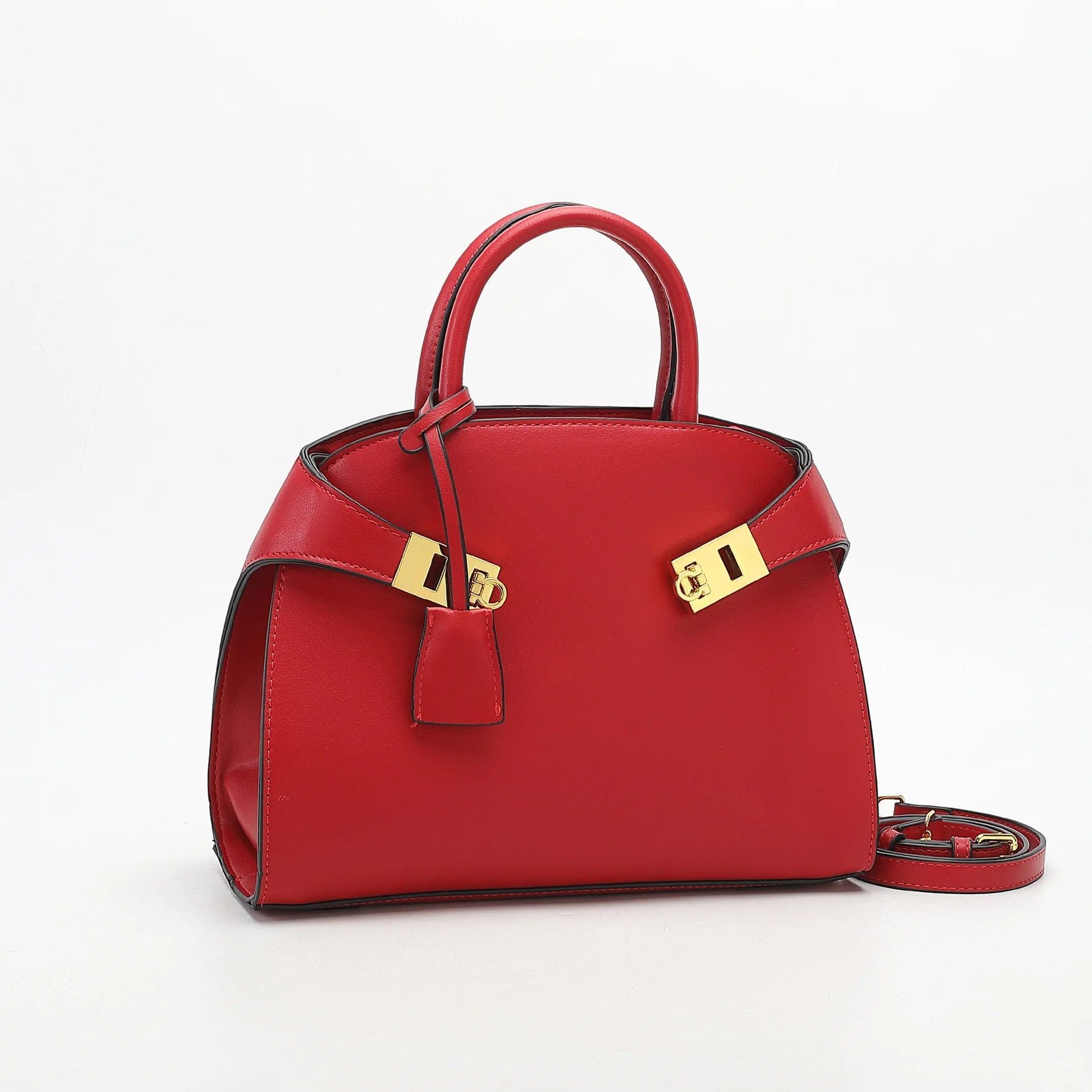 Red handbag with gold accents on a white background