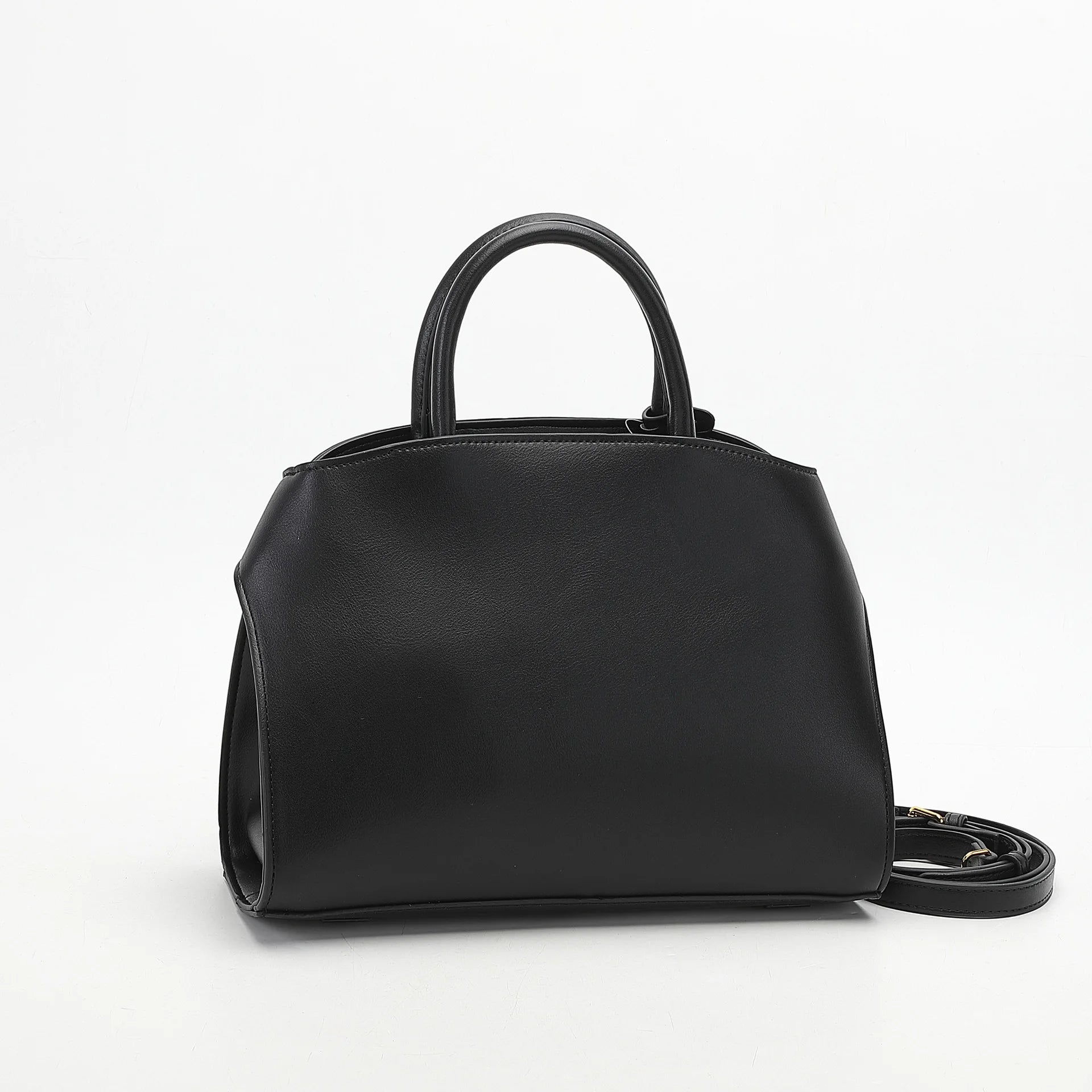 Black handbag with a shoulder strap on a white background