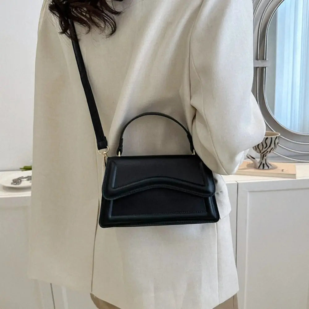 Trendy Crossbody Handbag with Unique Flap Design