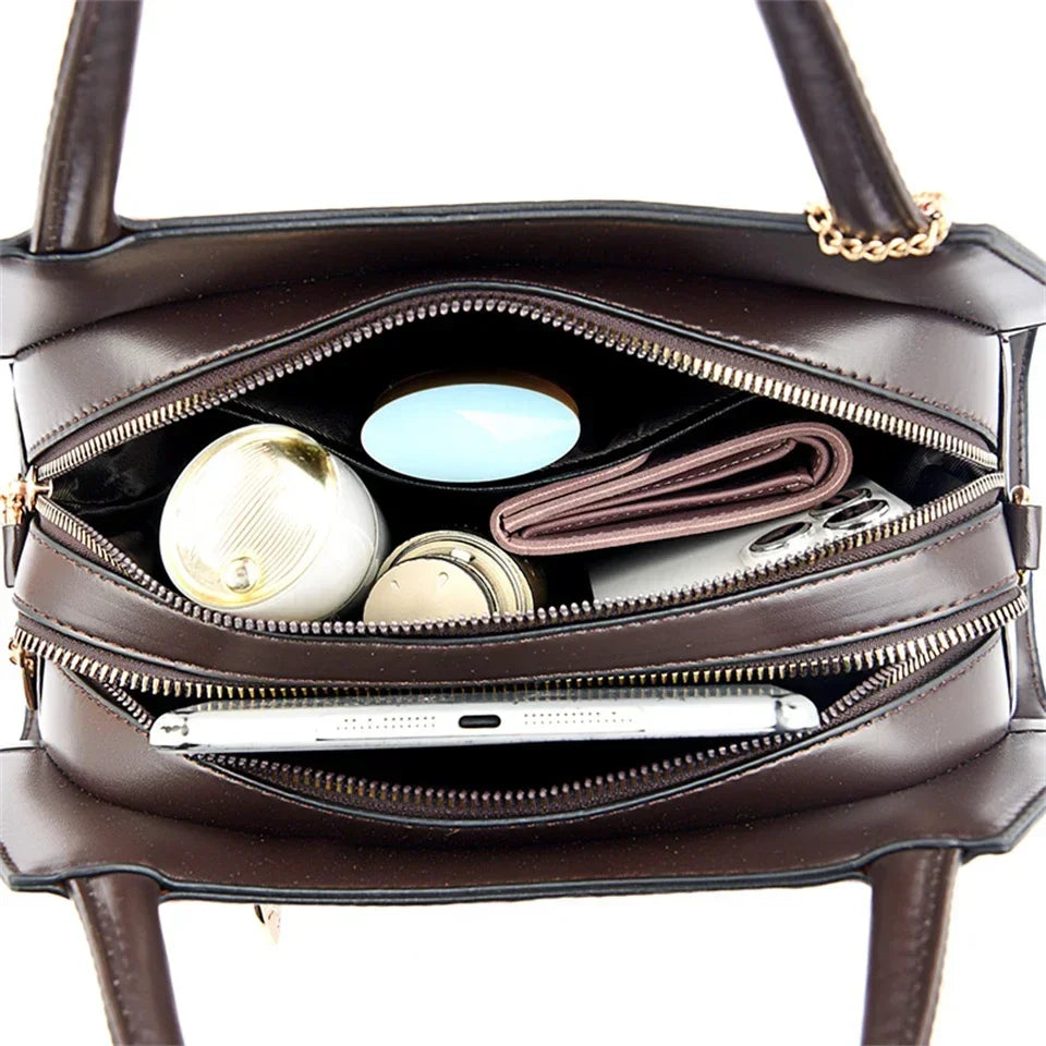 Regal Tote-Handtasche aus geprägtem Leder