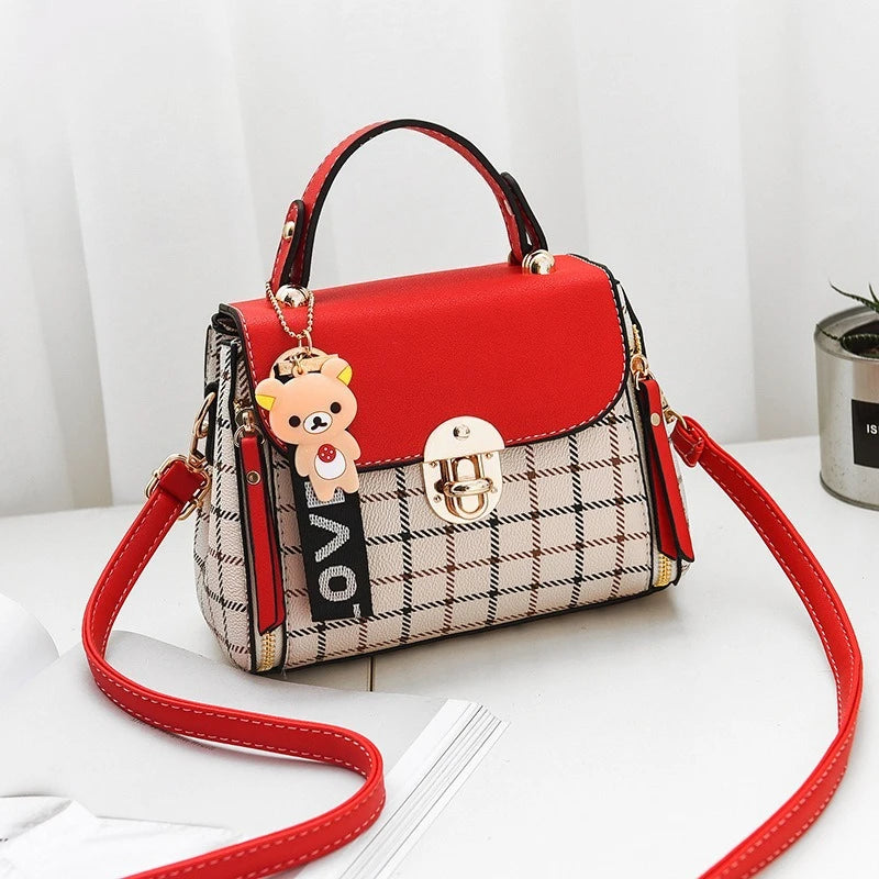 Chic Plaid Pattern Handbag with Charm Accents