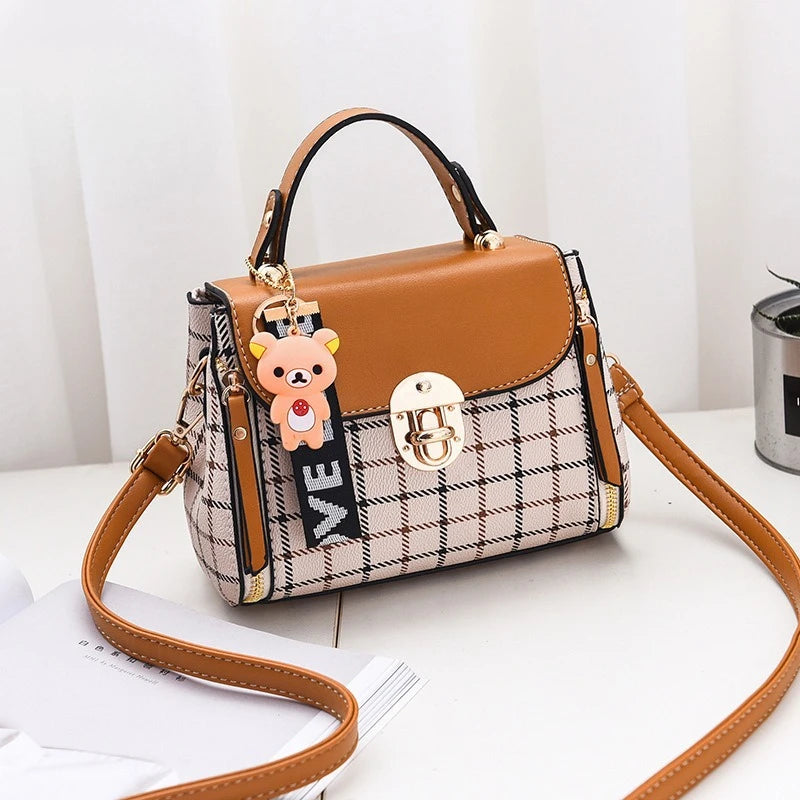 Chic Plaid Pattern Handbag with Charm Accents