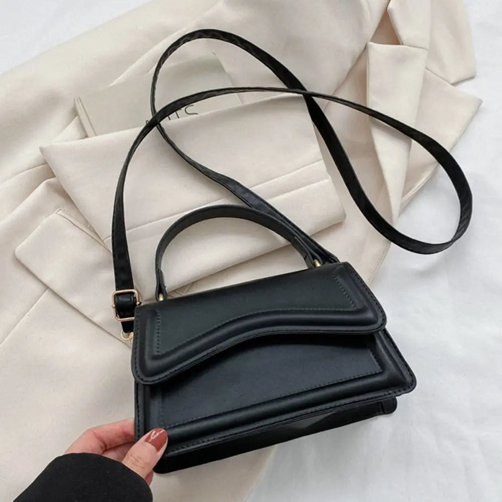 Trendy Crossbody Handbag with Unique Flap Design