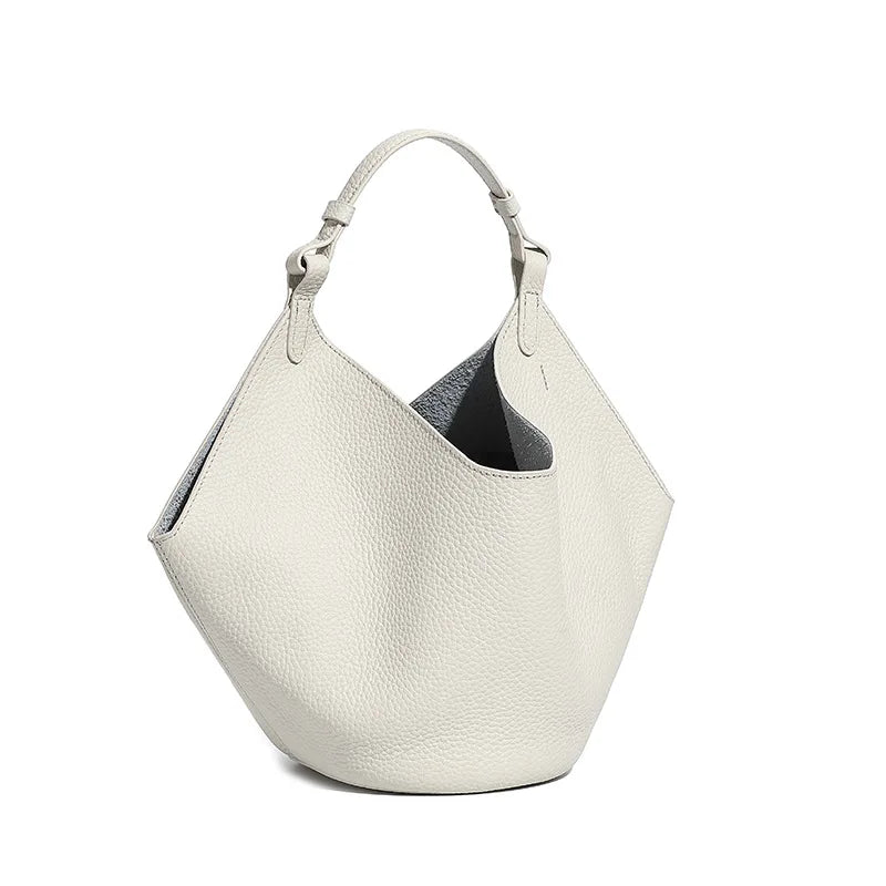 White textured handbag on a white background