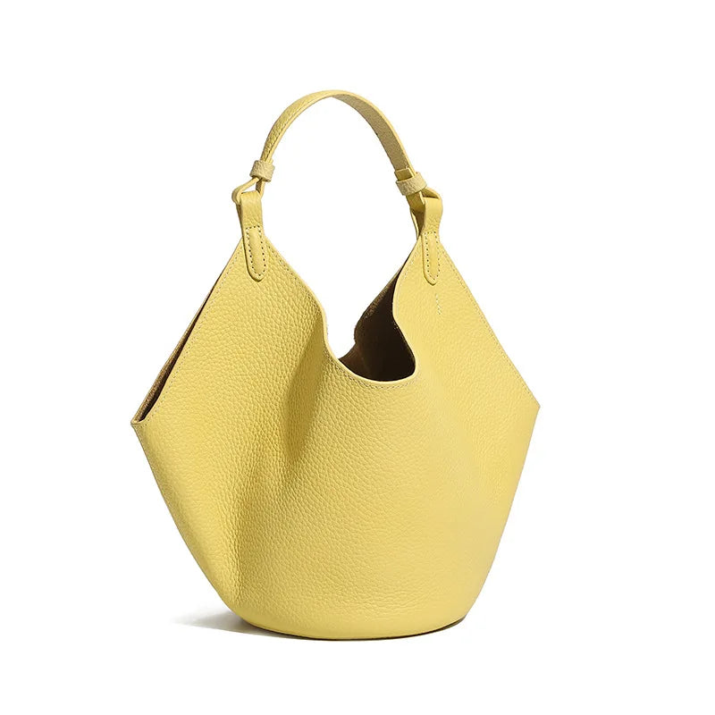Yellow handbag on a white background