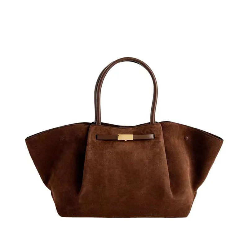 Brown suede tote bag with structured design and gold-tone clasp