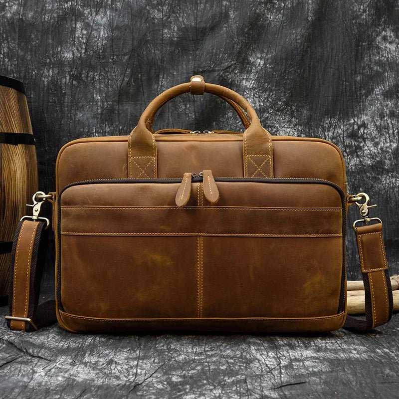 clasic light brown men bag on the gray background