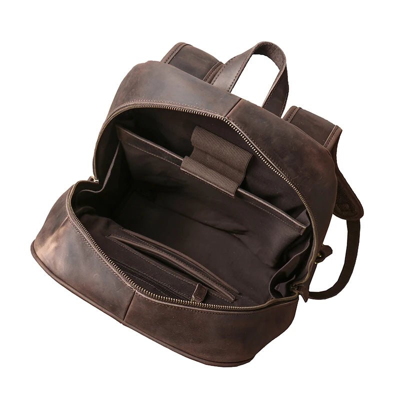Brown leather backpack on a white background