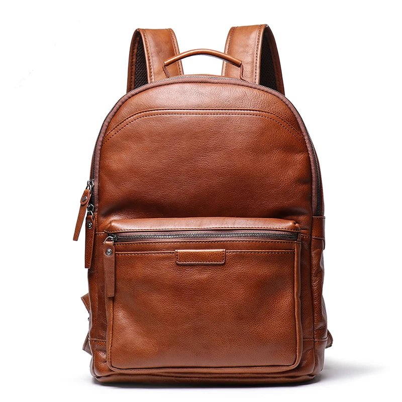 Brown leather backpack on a white background