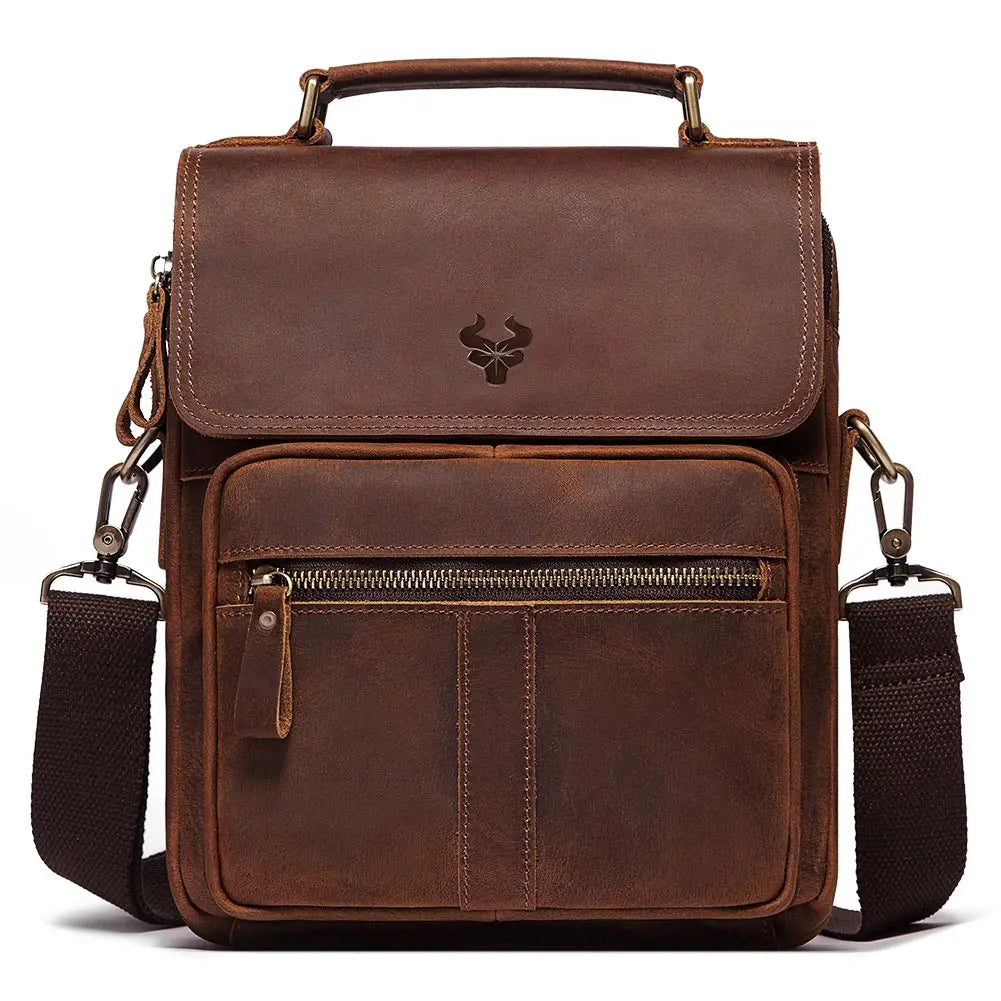 Brown leather bag with a shoulder strap on a white background