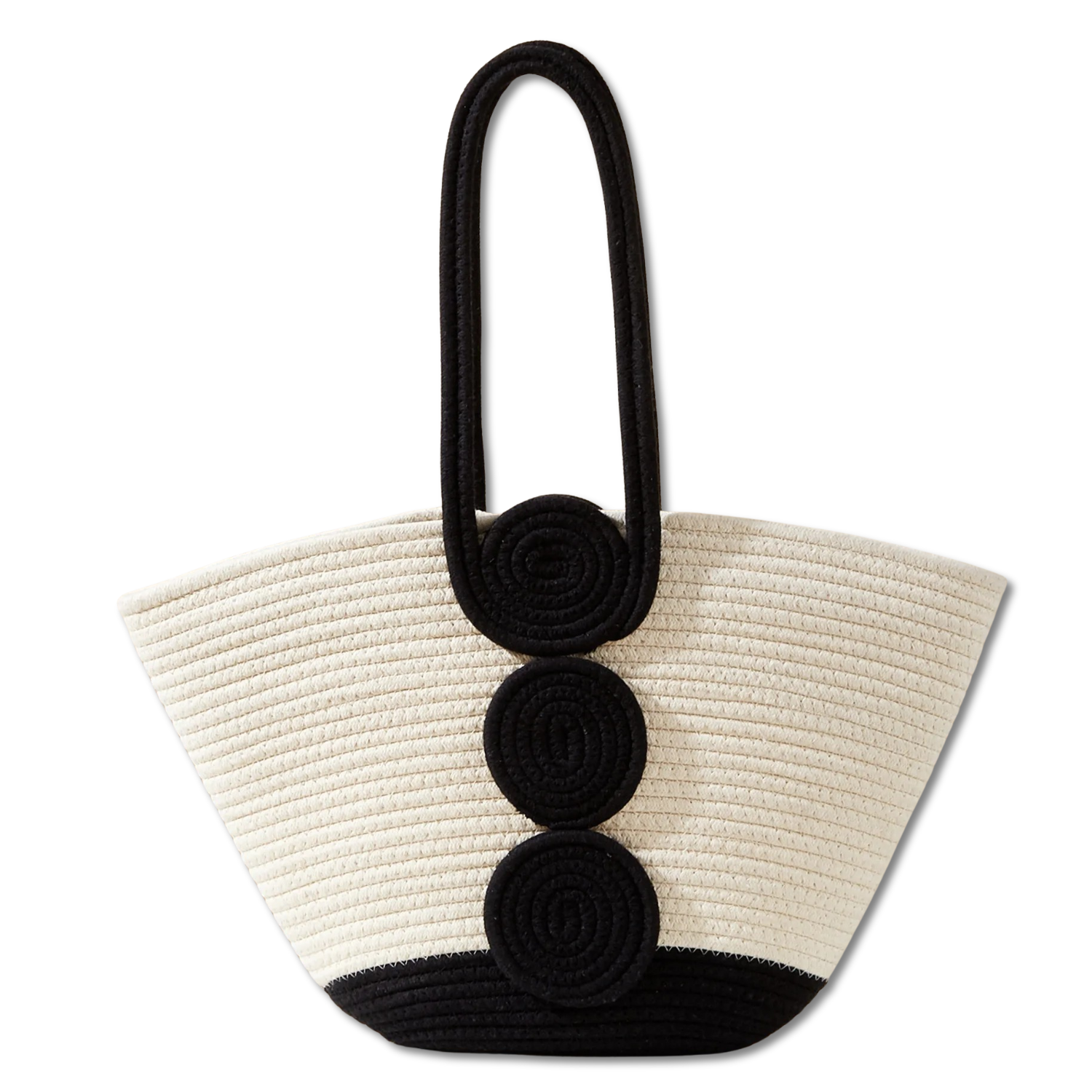 Beige straw handbag with black circular accents and handle on a white background
