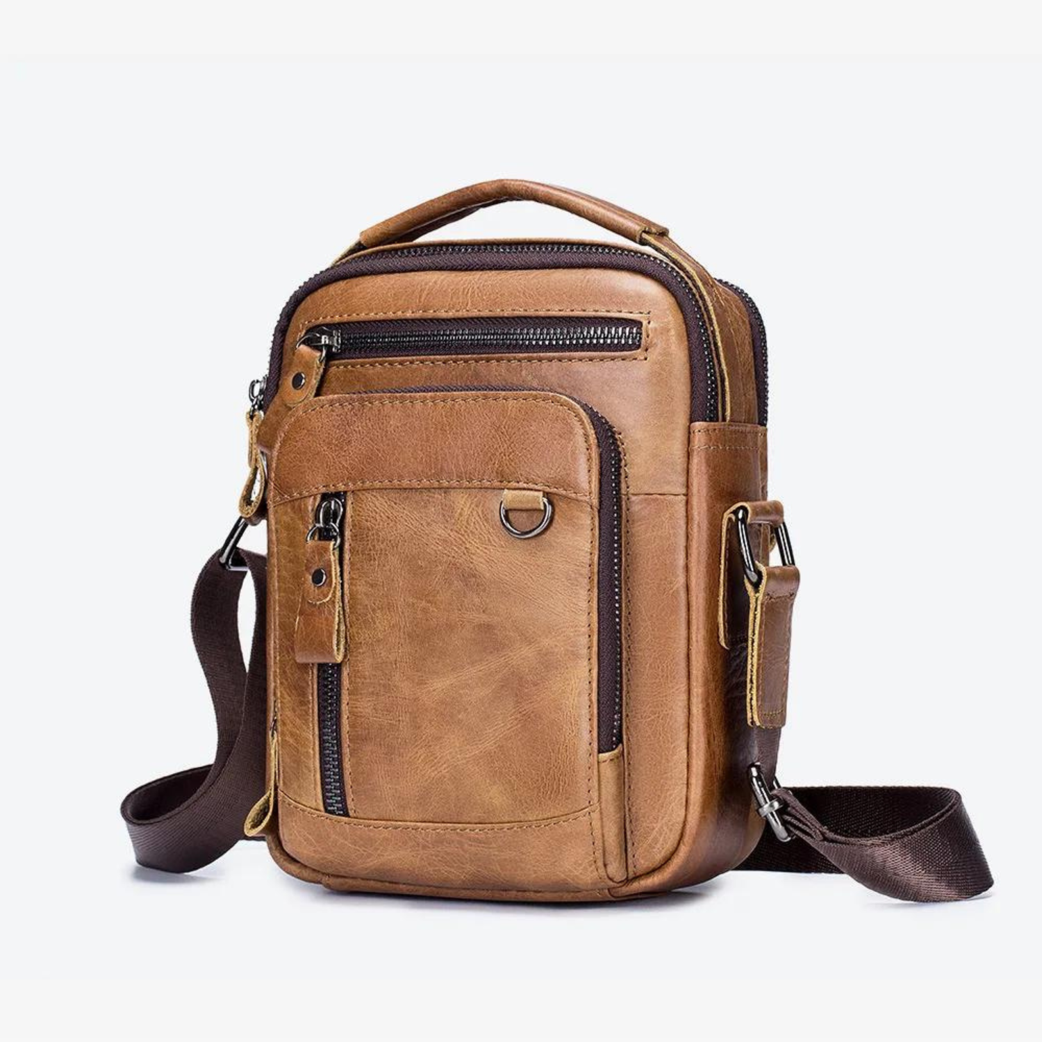 Brown leather crossbody bag on a white background