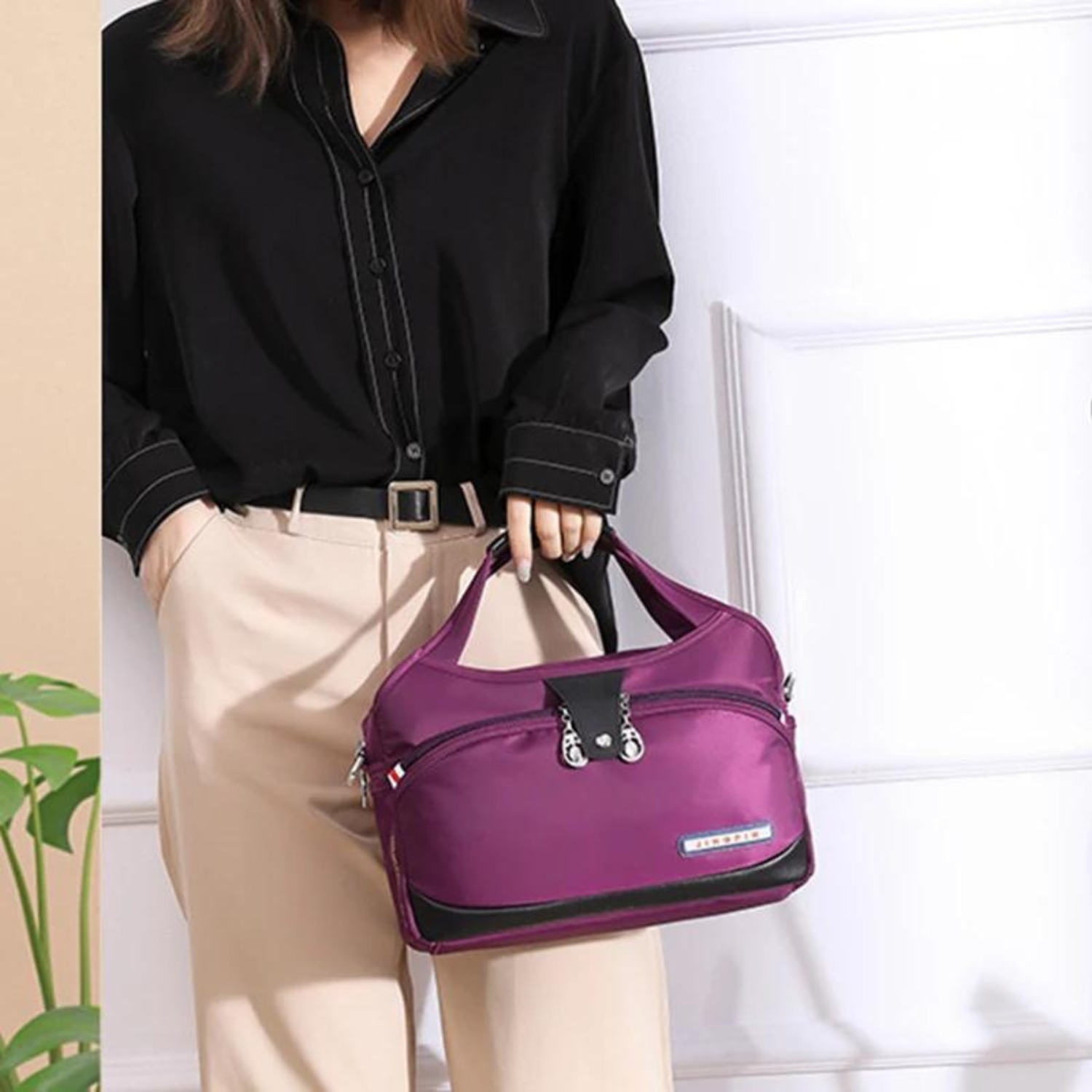 Versatile Voyager - Chic Waterproof Nylon Handbag