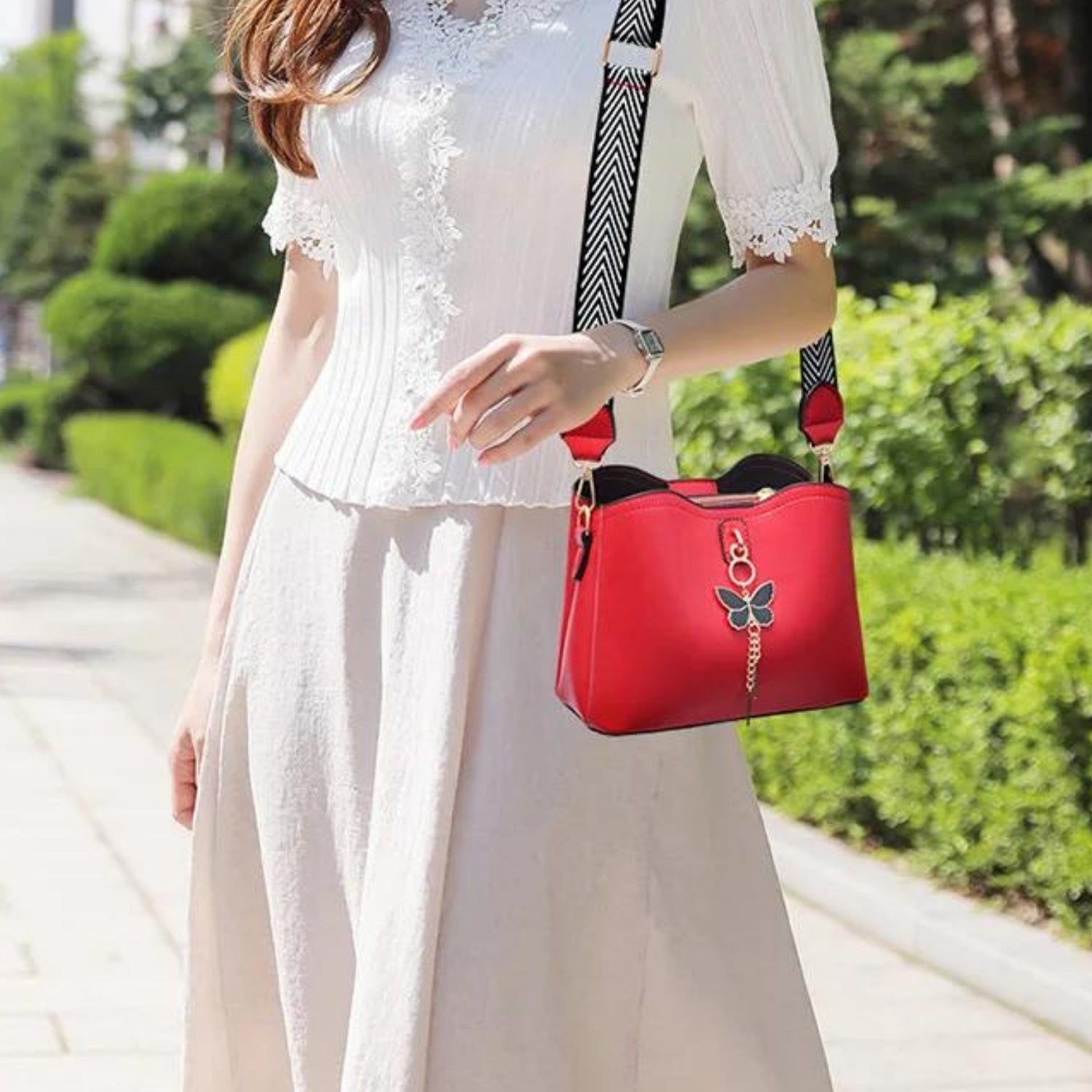 Modern Elegance Butterfly Tassel Handbag