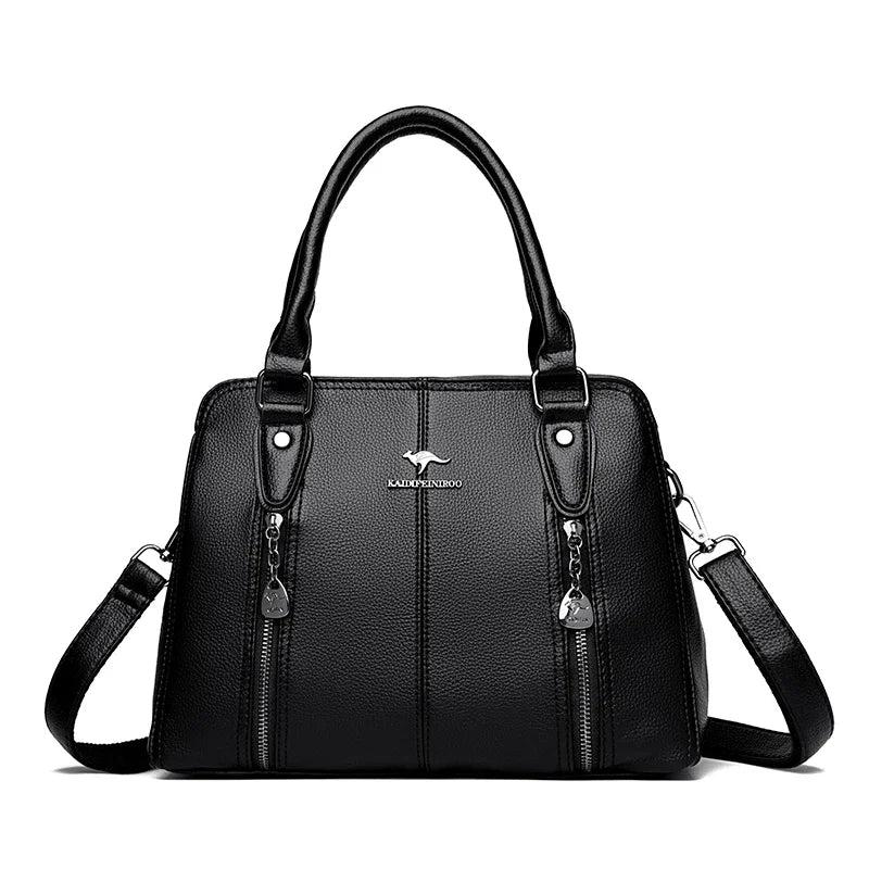 Black handbag with a visible brand logo on a white background