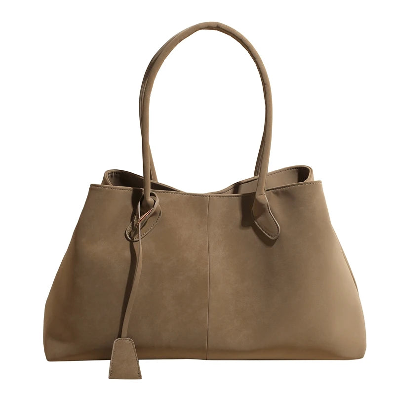 Brown handbag on a white background