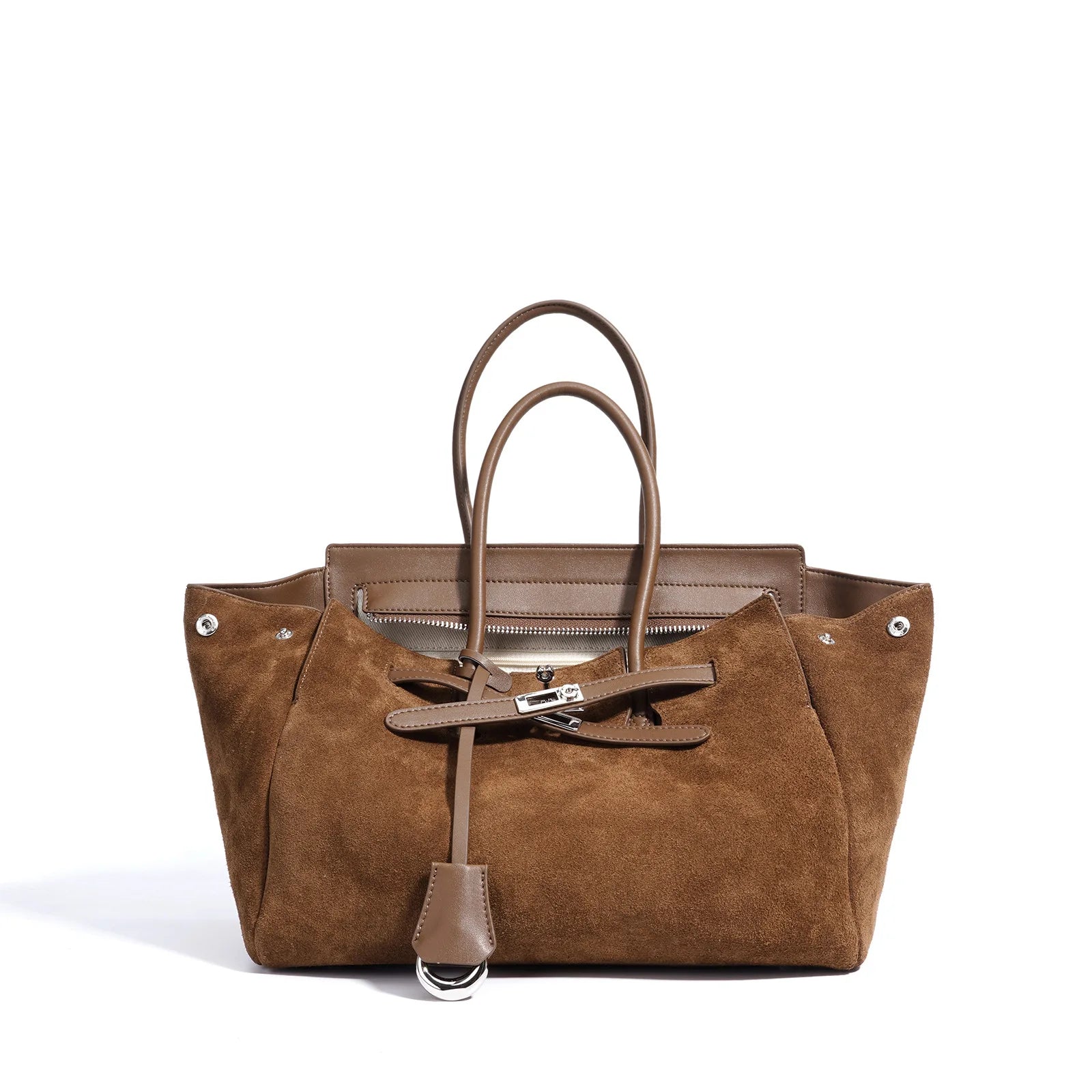 Brown suede handbag with matching strap on a white background
