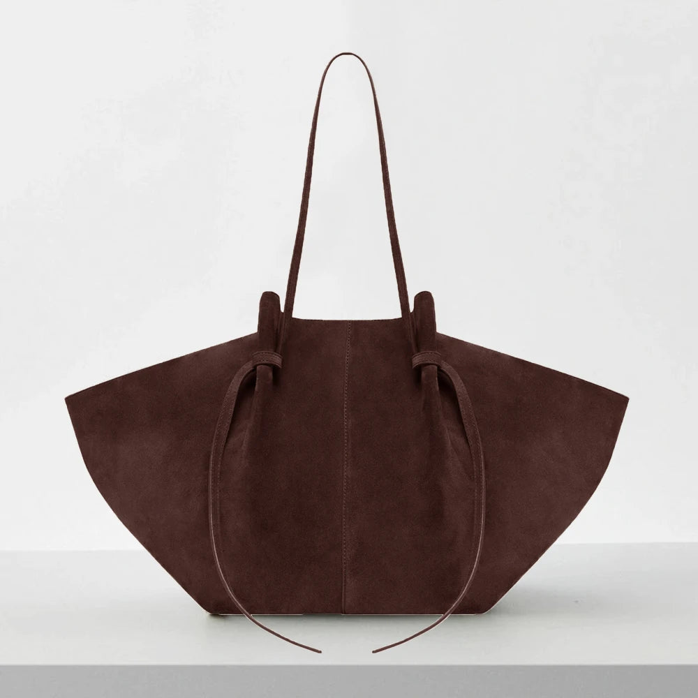 Dark Brown suede handbag on a white background