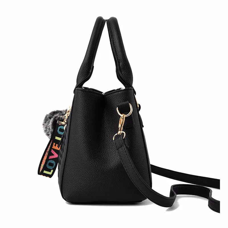 Elegant Embroidered Satchel with Charm