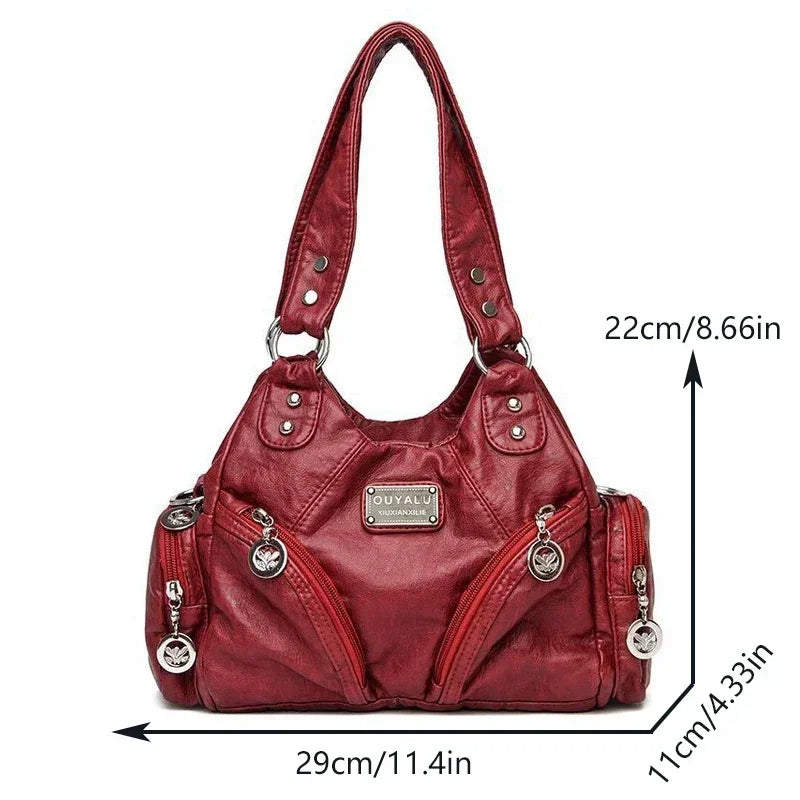 Red handbag with measurement details on a white background