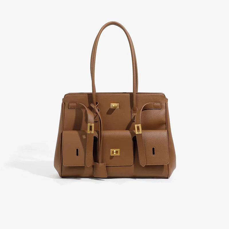 Luxury genuine leather tote bag in brown with gold lock – elegant and spacious women's handbag for work, commuting, and daily use.