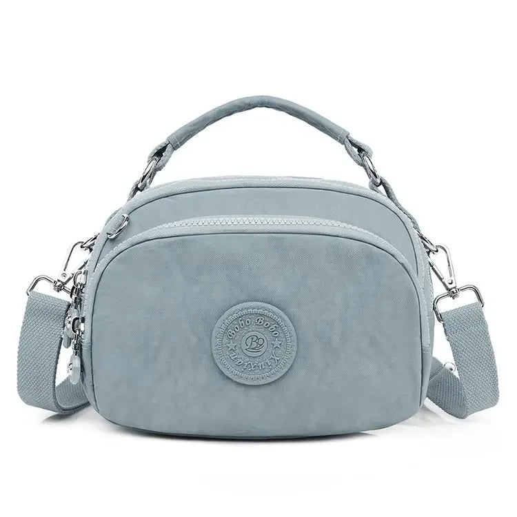Chic Sky Blue Crossbody Bag – Elegant & Versatile Companion