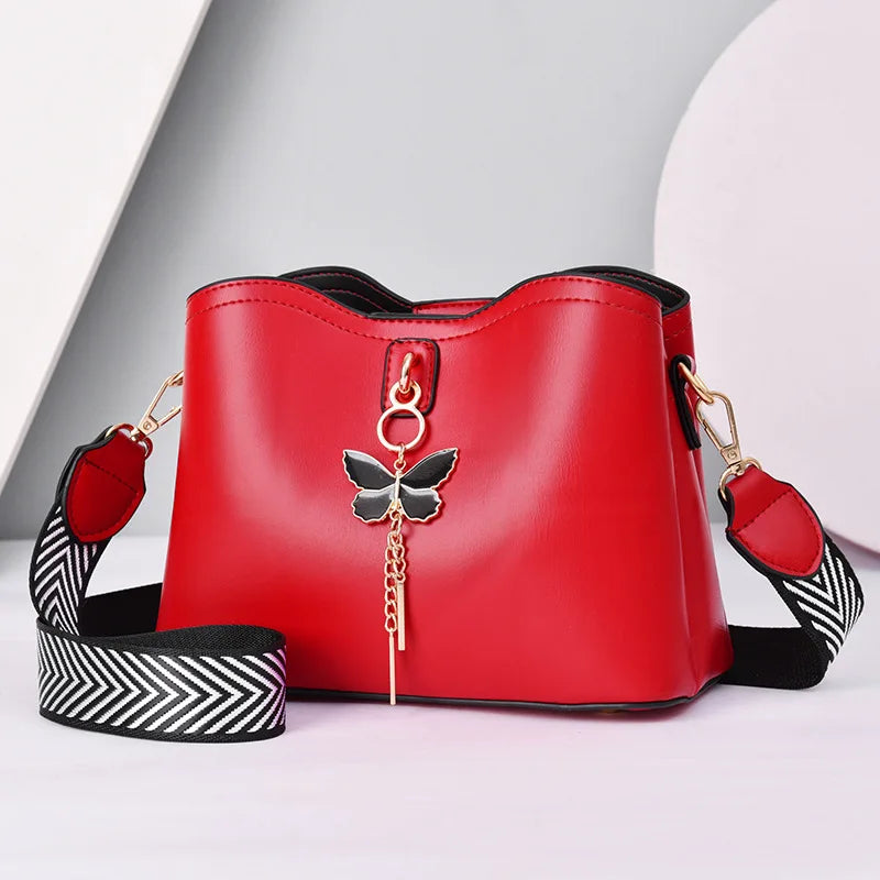 Modern Elegance Butterfly Tassel Handbag