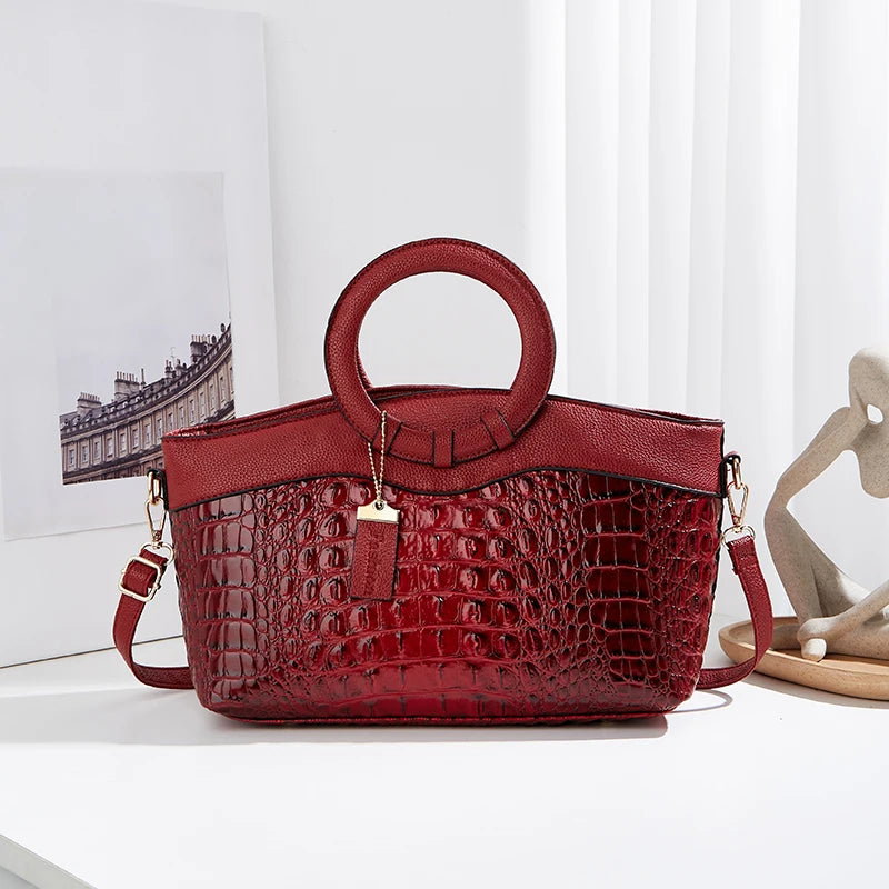 Klassische Satchel mit Krokoprägung in Auburn