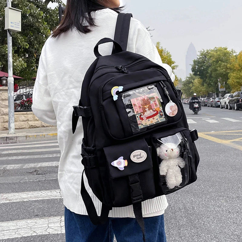 Stylish Multi-Pocket Backpack with Charm Details