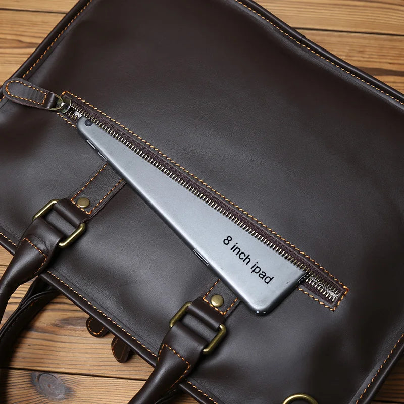 Brown leather bag with a 8-inch iPad inside on a wooden surface