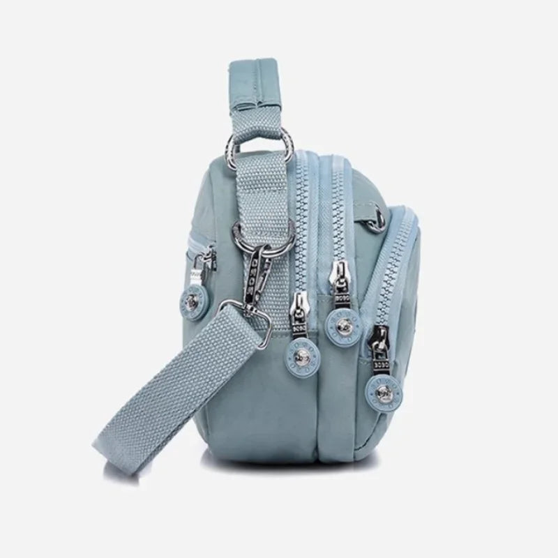 Chic Sky Blue Crossbody Bag – Elegant & Versatile Companion