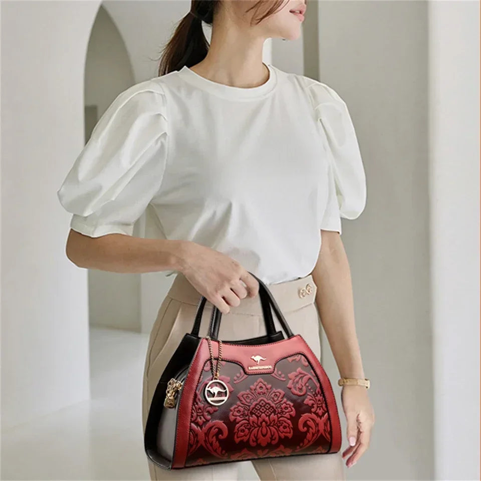 Regal Tote-Handtasche aus geprägtem Leder