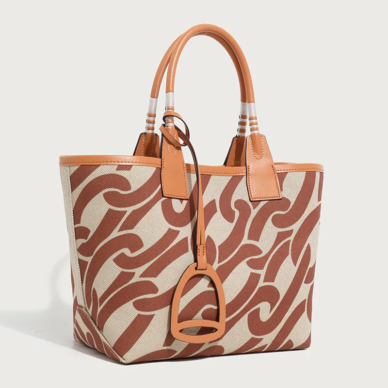 Tote bag with brown and beige pattern on a light gray background