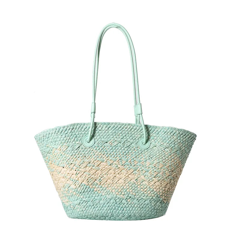 Woven handbag with a gradient design on a white background