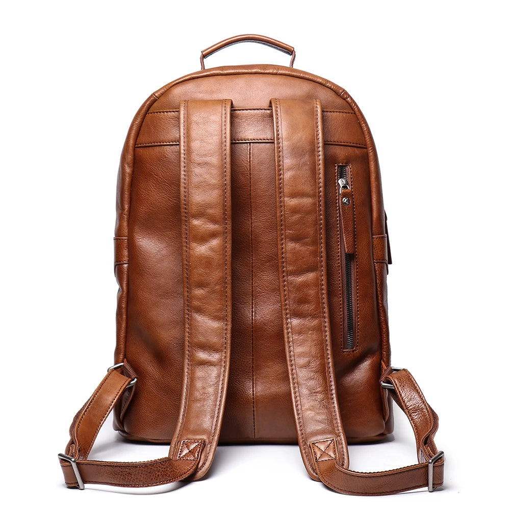 Brown leather backpack on a white background